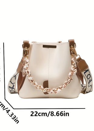 Nuevo bolso de hombro a la moda para mujer, bolso tipo cubo con cadena de cinta de gran capacidad, bolso cruzado para desplazamientos diarios