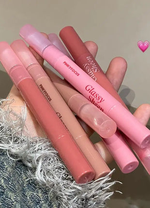 Brillo labial con vitamina E, suero labial hidratante y voluminizador, brillo labial con color, bálsamo labial humectante para labios brillantes, translúcidos y suaves.