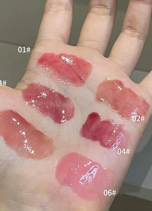 Brillo labial con vitamina E, suero labial hidratante y voluminizador, brillo labial con color, bálsamo labial humectante para labios brillantes, translúcidos y suaves.